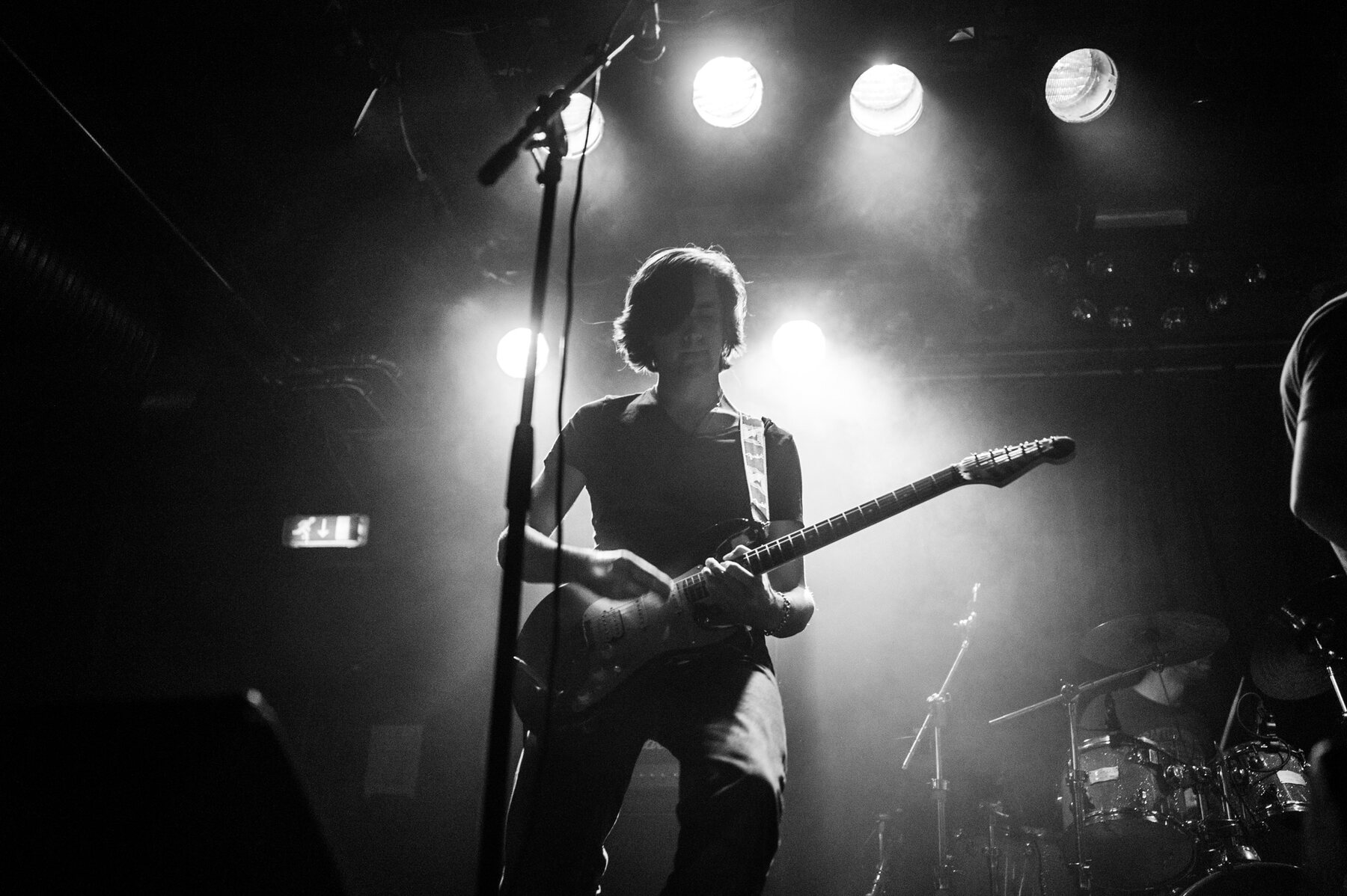 Sebastian Buurma performing guitar on stage
